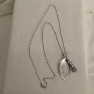 Silver spoon necklace with 16 " chain.